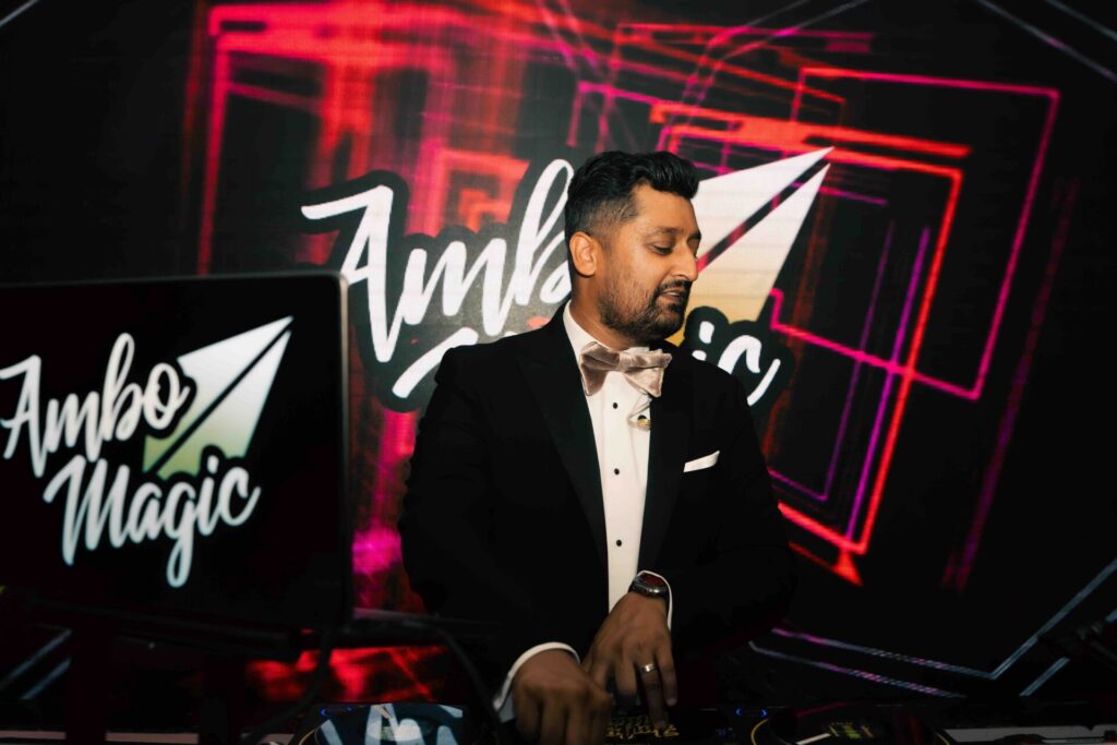 photo of dj ambo magic in the mix at a luxury asian wedding reception at north mymms park in hertfordshire
